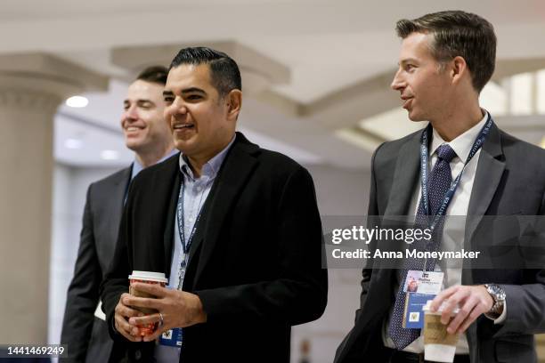 Rep.-Elect Robert Garcia and Will Rollins , a Democratic candidate for U.S. Representative from California, arrive at an orientation meeting in the...