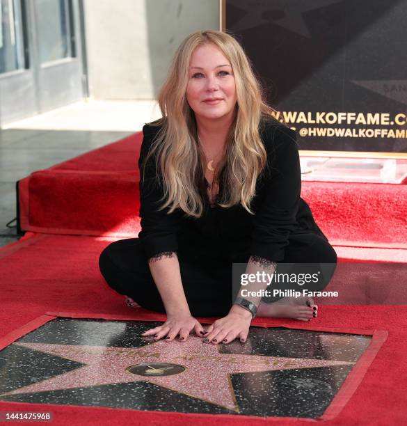 Christina Applegate poses with her star during her Hollywood Walk of Fame Ceremony at Hollywood Walk Of Fame on November 14, 2022 in Los Angeles,...