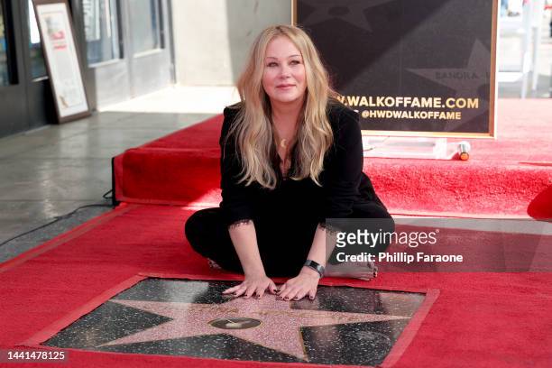 Christina Applegate poses with her star during her Hollywood Walk of Fame Ceremony at Hollywood Walk Of Fame on November 14, 2022 in Los Angeles,...