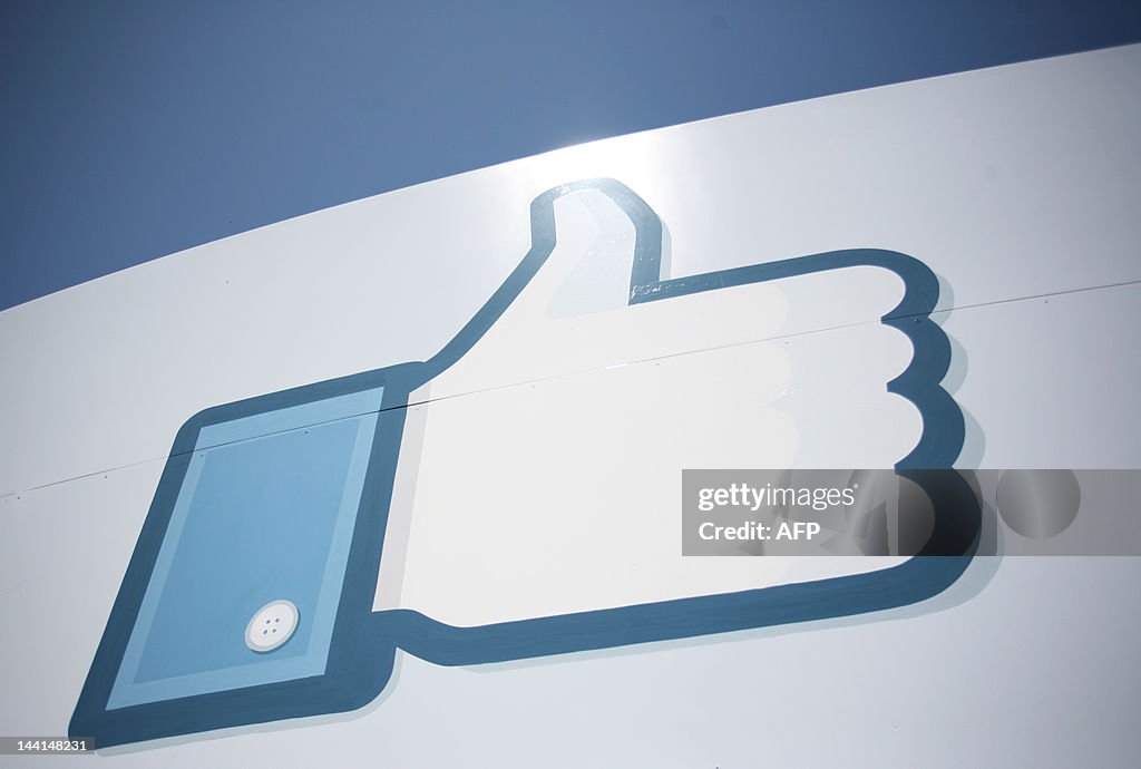 A Facebook Like Button logo is seen at t