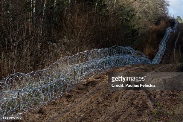 Newly instaled concertina wire seen on Poland's side of the border with Russian exclave Kaliningrad on November 14, 2022 in Goldap, Poland. The...