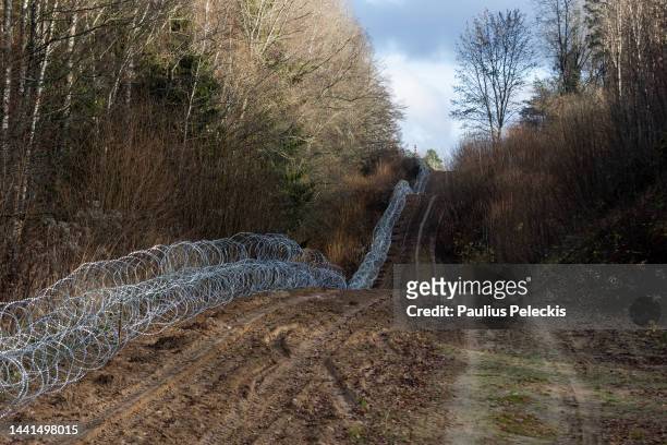 Newly instaled concertina wire seen on Poland's side of the border with Russian exclave Kaliningrad on November 14, 2022 in Goldap, Poland. The...