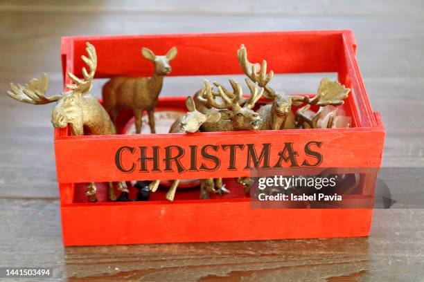 box with christmas ornaments - attic storage stockfoto's en -beelden