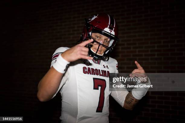 Spencer Rattler of the South Carolina Gamecocks heads to the field before the start of a game against the Florida Gators at Ben Hill Griffin Stadium...