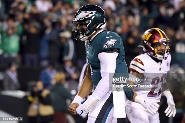 Jalen Hurts of the Philadelphia Eagles celebrates after scoring a touchdown against the Washington Commanders during the first quarter in the game at...