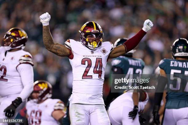 Antonio Gibson of the Washington Commanders celebrates after scoring a touchdown against the Philadelphia Eagles during the first quarter in the game...