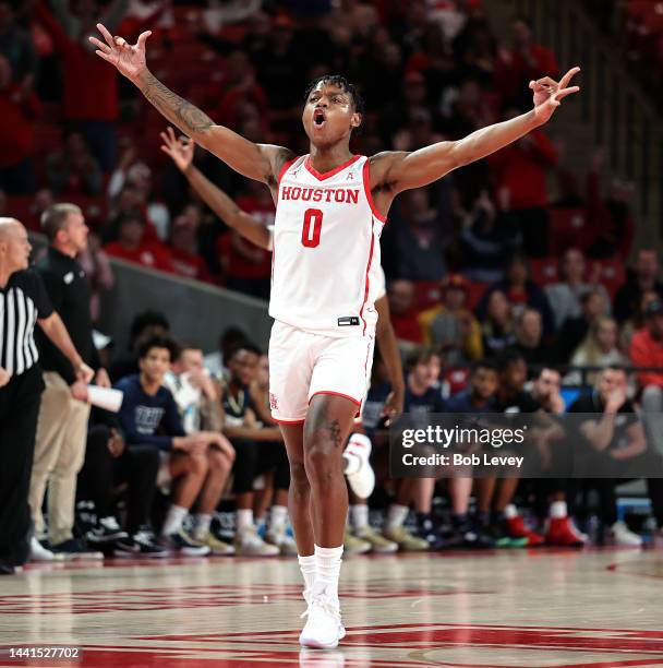 Marcus Sasser of the Houston Cougars reacts after three point basket against the Oral Roberts Golden Eagles at Fertitta Center on November 14, 2022...
