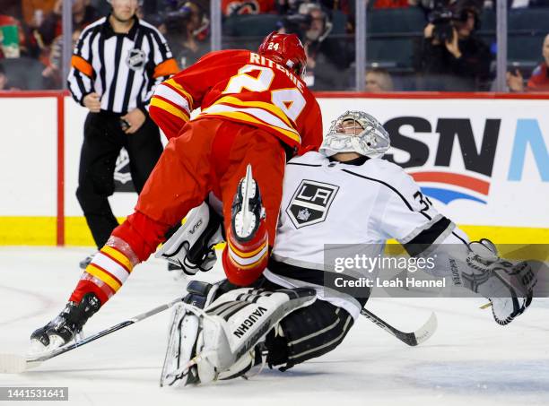 Brett Ritchie of the Calgary Flames scores on Jonathan Quick of the Los Angeles Kings during the first period at the Scotiabank Saddledome on...