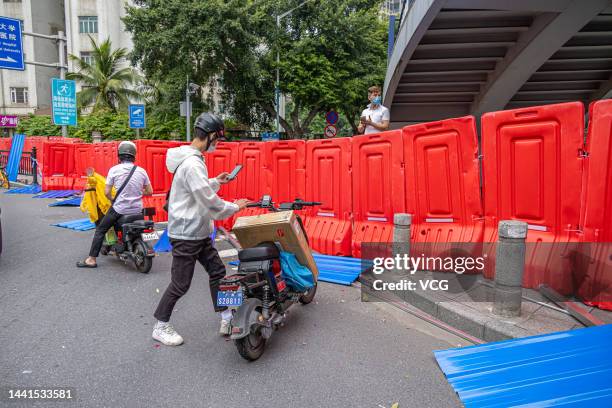 Barricade blocks off the controlled management area to contain the COVID-19 epidemic on November 14, 2022 in Guangzhou, Guangdong Province of China.