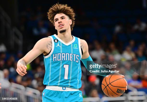 LaMelo Ball of the Charlotte Hornets controls the ball in the first half against the Orlando Magic at Amway Center on November 14, 2022 in Orlando,...