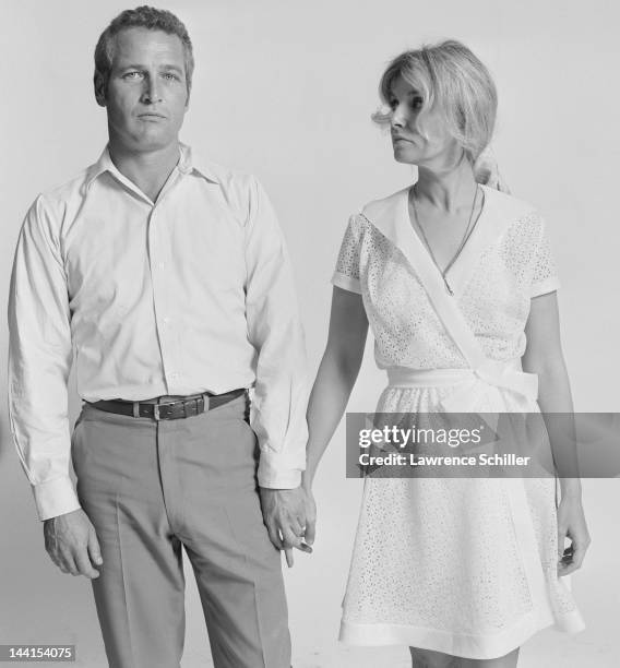 Portrait of married American actors Paul Newman and Joanne Woodward as they hold hands, Los Angeles, California, 1967.