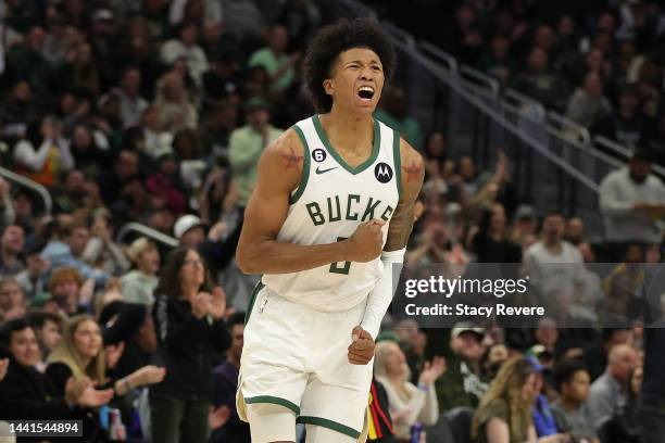 MarJon Beauchamp of the Milwaukee Bucks reacts to a three point shot against the Atlanta Hawks during the second half of a game at Fiserv Forum on...