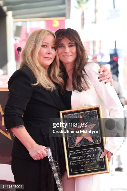 Christina Applegate and Linda Cardellini attend a ceremony honoring Christina Applegate with a star on the Hollywood Walk Of Fame on November 14,...