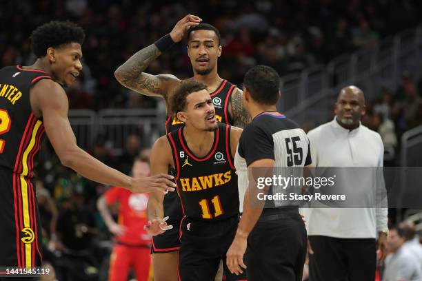 Trae Young of the Atlanta Hawks speaks with referee Bill Kennedy after being called for a technical foul during the second half of a game against the...