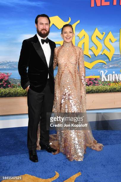 Danny Fujikawa and Kate Hudson attend the premiere of "Glass Onion: A Knives Out Mystery" at Academy Museum of Motion Pictures on November 14, 2022...