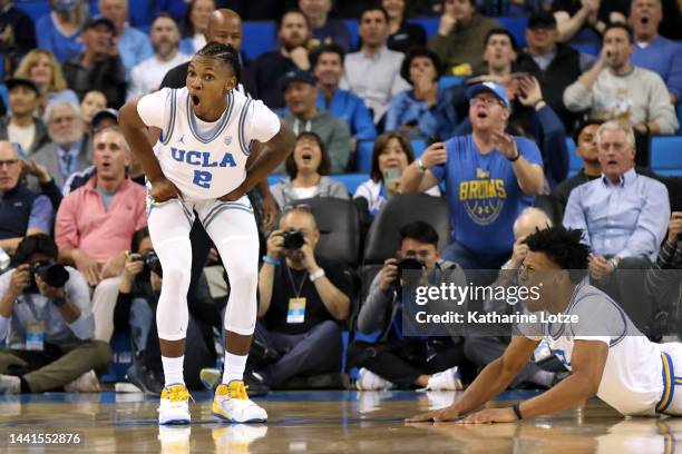 Dylan Andrews and Jaylen Clark of the UCLA Bruins react to an officiating call during the second half of a game against the Norfolk State Spartans at...