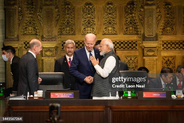 Chancellor Olaf Scholz of Germany , President Joe Biden of the United States of America and Prime Minister Narendra Modi of India chat ahead of a...