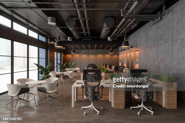 interior of eco-friendly open plan office with desks, computers, plants and waiting area - desk with green space view stock pictures, royalty-free photos & images