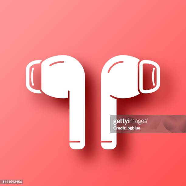 wireless earphones. icon on red background with shadow - wireless earbuds vector stock illustrations