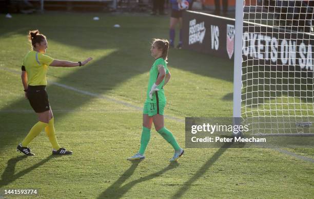 Referee Kate Jacewicz talks to Victoria Esson of New Zealand as she awards a penalty shot during the International Friendly match between the New...