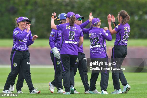 The Hobart Hurricanes celebrate a wicket during the Women's Big Bash League match between the Hobart Hurricanes and the Melbourne Stars at Latrobe...