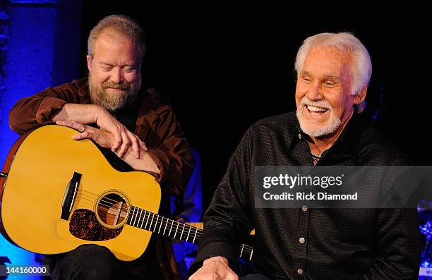 Singers/Songwriters Don Schlitz and Kenny Rogers perform at the Country Music Hall Of Fame And Museum's in the Ford Theater as part of Kenny's...