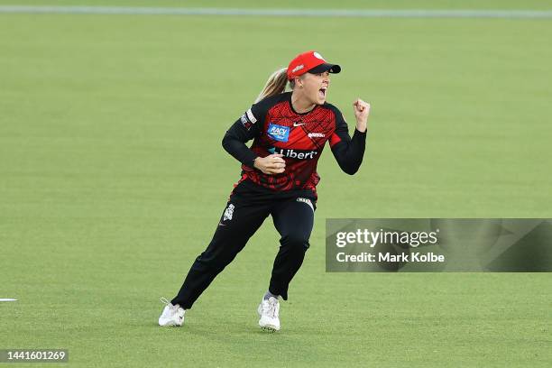 Georgia Prestwidge of the Renegades celebrates taking the catch for the wicket of Tammy Beaumont of the Thunder during the Women's Big Bash League...