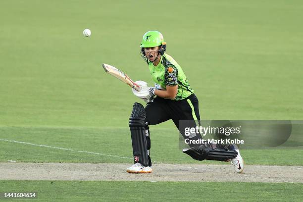 Phoebe Litchfield of the Thunder bats during the Women's Big Bash League match between the Sydney Thunder and the Melbourne Renegades at Manuka Oval,...