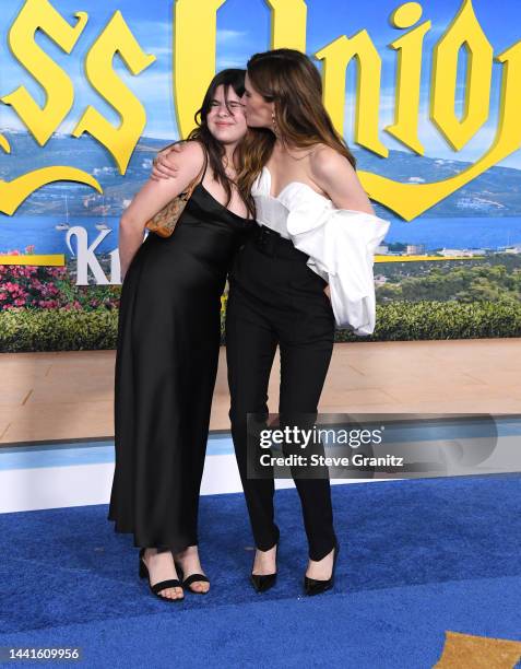 Kathryn Hahn and Mae Sandler arrives at the Premiere Of "Glass Onion: A Knives Out Mystery" at Academy Museum of Motion Pictures on November 14, 2022...