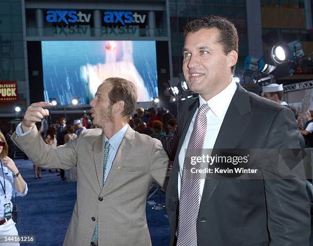 Director/producer Peter Berg and producer Scott Stuber arrive at the premiere of Universal Pictures' "Battleship" at Nokia Theatre L.A. Live on May...