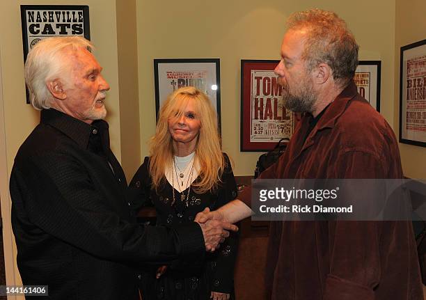 Singers/Songwriters Kenny Rogers, Kim Carnes and Don Schlitz backstage at the Country Music Hall Of Fame And Museum's in the Ford Theater as part of...