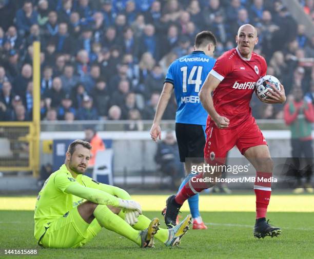 Club Brugge KV goalkeeper Simon Mignolet shows dejection as Michael Frey grabs the ball after scoring Royal Antwerp FC first goal during the Jupiler...