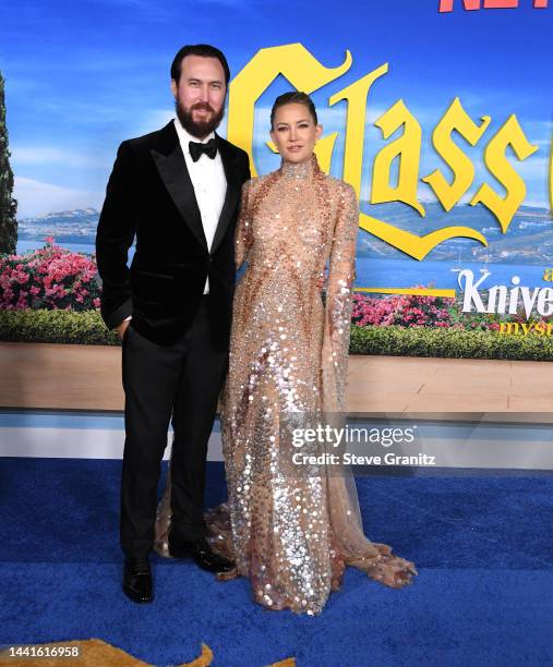 Danny Fujikawa and Kate Hudson arrives at the Premiere Of "Glass Onion: A Knives Out Mystery" at Academy Museum of Motion Pictures on November 14,...