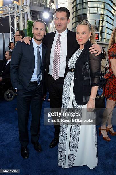 Actor Taylor Kitsch, producer Scott Stuber, and actress Molly Sims attend the Los Angeles premiere of "Battleship" at Nokia Theatre L.A. Live on May...
