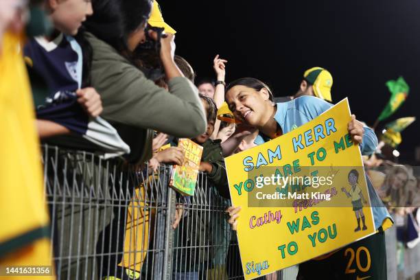 Sam Kerr of the Matildas interacts with fans after the International Friendly match between the Australia Matildas and Thailand at Central Coast...