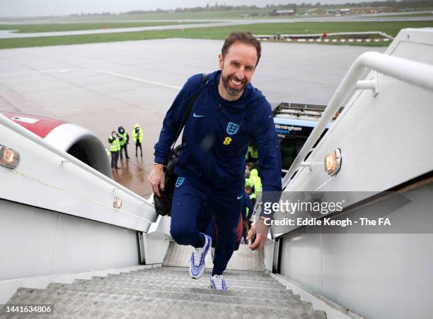 Gareth Southgate, Manager of England boards the plane as the England squad travel to Qatar on November 15, 2022 in Birmingham, England.