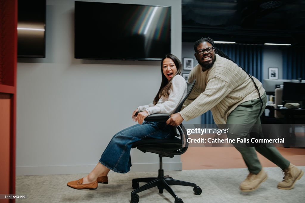 Comical image of the late night antics of two misbehaving office workers