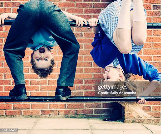 school children playing - upside down stock pictures, royalty-free photos & images