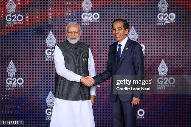 Prime Minister Narendra Modi of India is greeted by the President of the Indonesian Republic Joko Widodo during the formal welcome ceremony to mark...