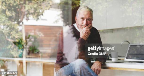 laptop, thinking and senior businessman at kitchen table planning, brainstorming or decision for retirement, pension finance and asset management. idea, inspiration and work from home man by window - só um homem idoso imagens e fotografias de stock