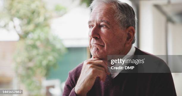 dementia, senior man and thinking in retirement home, future and pension risk, funeral policy and reflection at apartment window. sad, depression and elderly old man,  alzheimer and memory problem - funeral stock pictures, royalty-free photos & images