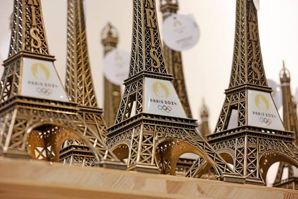 Replicas of the Eiffel Tower with the logo of the 2024 Olympic Games for the Paris 2024 Summer Olympic and Paralympic Games are displayed inside the...