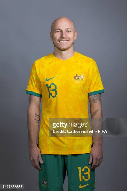 Aaron Mooy of Australia poses during the official FIFA World Cup Qatar 2022 portrait session on November 15, 2022 in Doha, Qatar.