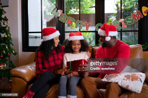 family celebration for christmas at home. - christmas tree close up stock pictures, royalty-free photos & images