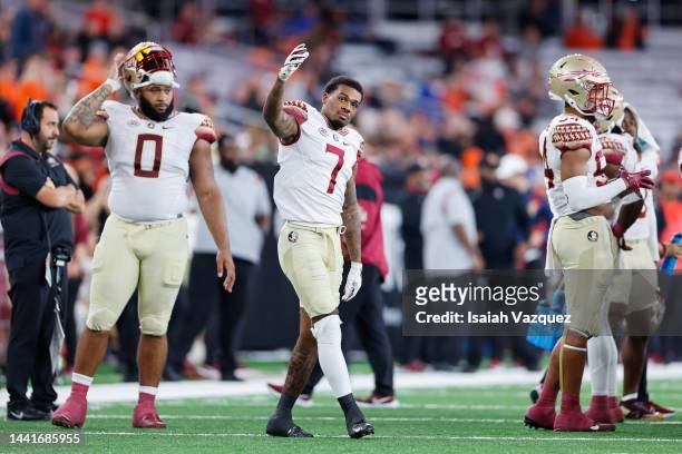 Jarrian Jones of the Florida State Seminoles waves to the crowd while taking on the Syracuse Orange at JMA Wireless Dome on November 12, 2022 in...