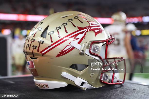 Florida State Seminoles helmet sits on the sidelines as the Florida State Seminoles take on the Syracuse Orange at JMA Wireless Dome on November 12,...