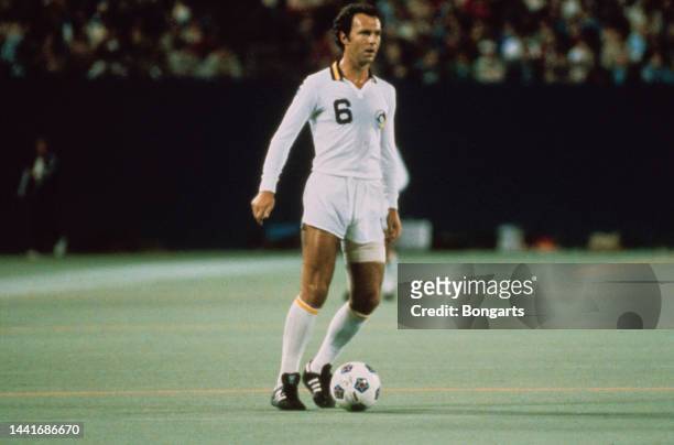 German footballer Franz Beckenbauer in action for New York Cosmos, match, circa 1977. A central defender, Beckenbauer is acknowledged as having...