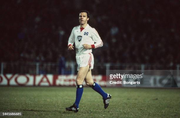 German footballer Franz Beckenbauer in action for Hamburger SV, match, circa 1981. A central defender, Beckenbauer is acknowledged as having...