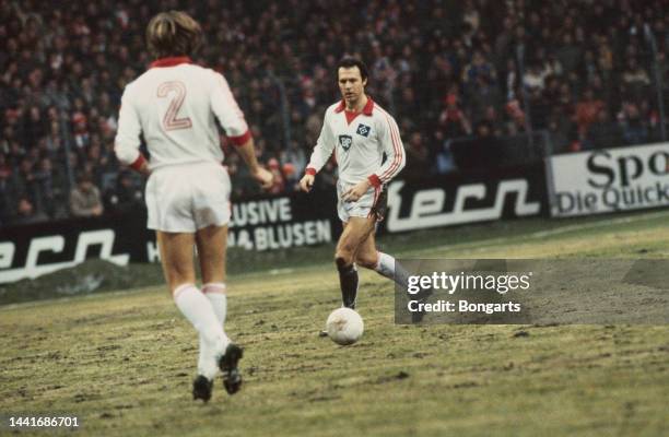 German footballer Franz Beckenbauer in action for Hamburger SV, match, circa 1981. A central defender, Beckenbauer is acknowledged as having...