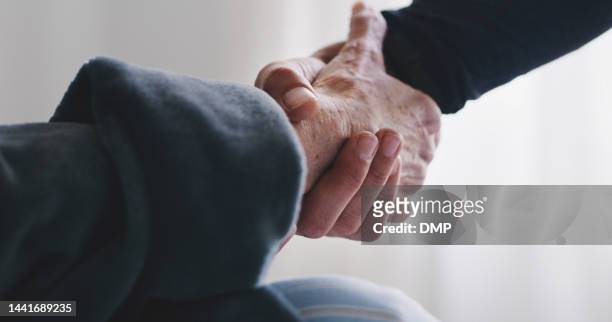 nurse hands help senior patient, homecare and support, kindness or medical counseling in nursing home. caregiver holding hands, trust and empathy of elderly person, retirement home and rehabilitation - kindness stock pictures, royalty-free photos & images